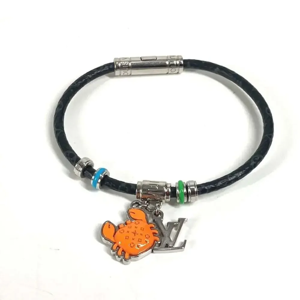 LOUIS VUITTON Black Monogram Canvas Charm Bracelet - Picture 1 of 8